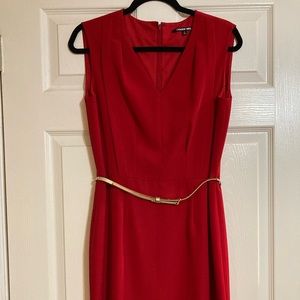 Red sleeveless shift dress with gold skinny belt